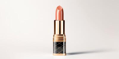 AI generated An peach fuzz color lipstick in a black and gold case on a white background. Make up a product photo shoot. Copy space.