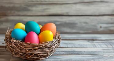 AI generated Colored eggs in the wicker basket on  wood bckground. photo