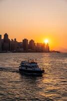 Sunset atmosphere at Victoria harbour in Hong Kong photo