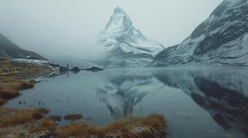 ai generado montaña reflejando en todavía lago foto