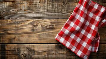 AI generated Red and White Checkered Cloth on Wooden Table photo