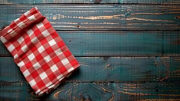 AI generated Red and White Checkered Cloth on Wooden Table photo