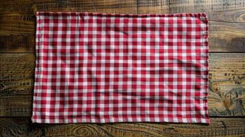 AI generated Red and White Checkered Cloth on Wooden Surface photo