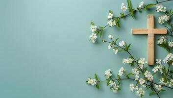AI generated Wooden cross and white flowers on blue background with copy space. photo