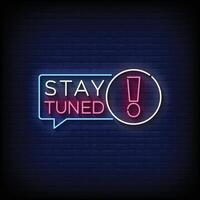 Neon Sign stay tuned with brick wall background vector
