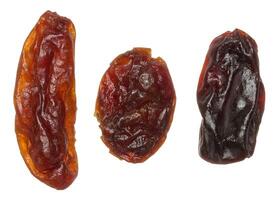 Pile of raisins on isolated background, top view photo