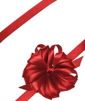 Tied bow made of red silk ribbon on an isolated background, decor for a gift photo