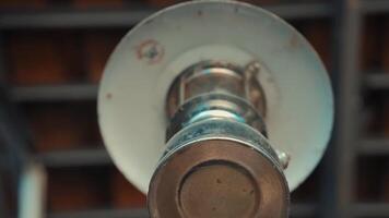 Close-up of a rusty metal pipe with flange on a blurred background. video