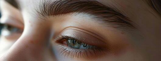 AI generated Close-up of beautiful woman's eye with long eyelashes photo