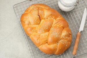 Roti Manis Ayam, sweet bread filled with shredded chicken and sesame seed photo