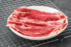 Slice raw beef or shortplate photo