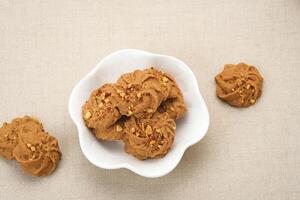 Chocolate cookies with peanut sprinkles photo