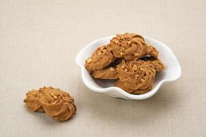 Chocolate cookies with peanut sprinkles photo