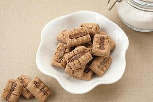 Kue Sagu or Sago Bites, healthy cookies made from sago flour, tapioca flour, low fat butter, and chocolate photo