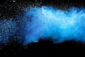 Blue Dust Splash, Closeup on Isolated Black Background photo