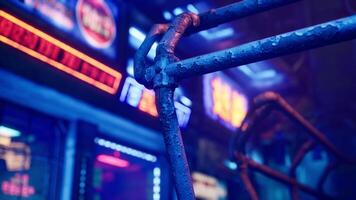 A close up of a metal bar with neon signs in the background video