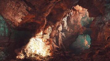 A cave filled with lots of rocks and water video