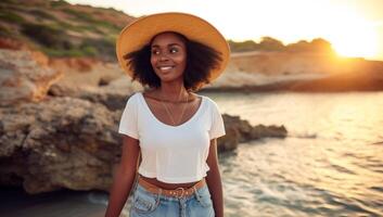 AI generated Joyful young Black woman enjoying a sunset by the sea, wearing a summer hat and casual outfit during a serene vacation on the coast. Concept of travel, contentment, and relaxation photo