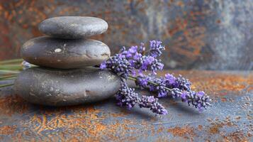 AI generated A serene spa setting is captured in a still life composition, showcasing a balanced stack of stones alongside delicate sprigs of lavender. photo