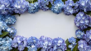 AI generated Flower border frame of blue hydrangea flowers on white background photo