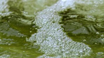 Moving Water Texture Background With Sparkling And Bubbles Footage video