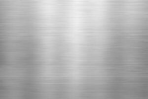 Silver metal texture of brushed stainless steel plate with the reflection of light.. photo
