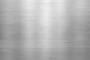 Silver metal texture of brushed stainless steel plate with the reflection of light.. photo