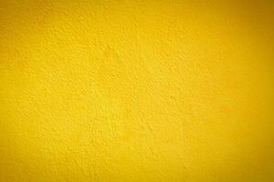 Vibrant Yellow Cement Wall Texture, Perfect Background for Design Projects. photo