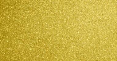 Glimmering Gold, Abstract Bokeh Lights with Sparkling Glitter. photo