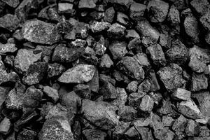 Black Natural Coal Heap in a Coal Mine, Industrial Texture Background photo