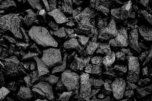 Black Natural Coal Heap in a Coal Mine, Industrial Texture Background photo
