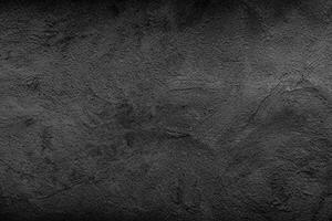 Bold Black Wall Texture, A Striking and Textured Background photo