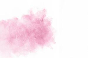 vibrante rosado polvo explosión, explosivo chapoteo en limpiar blanco superficie. foto
