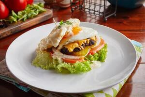 Egg Cream signature Italian Burger served in a dish isolated on wooden background side view photo