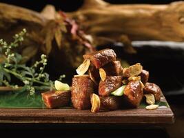 Sauteed Beef Cubes with Foie Gras Sauce Garlic served dish isolated on background top view food photo
