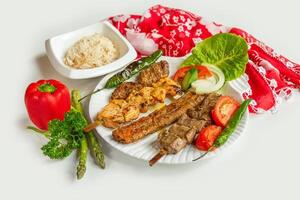 in a dish isolated on colorful table cloth top view on grey background photo