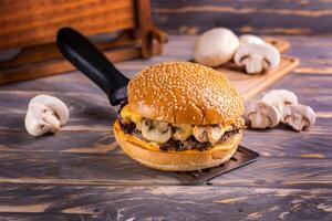 Grilled Chicken BBQ Sandwich isolated on cutting board top view on dark background american fast food photo