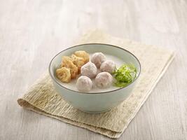 Handmade Meatball Congee served in a dish isolated on mat side view on grey background photo