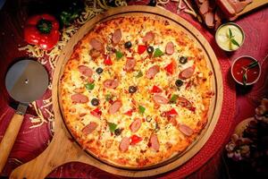 Sausage pizza with tomato sauce and mayo isolated on wooden board top view of italian food on wooden background photo