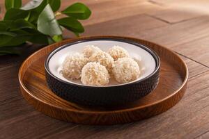 Snowflake Glutinous Rice Steamed Meatballs served dish isolated on wooden table top view of Hong Kong food photo