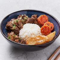 Beef Stew rice with carrot and potato served in a dish isolated on grey background side view of vietnam food photo