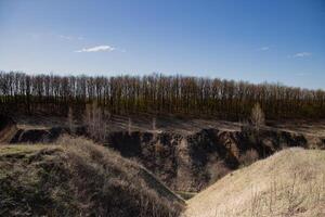 landscape with mountains, burn and sky, view of the city, mountains and trees in spring, spring photo