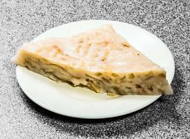 Steamed Carrot Cake served in bowl isolated on background top view of hong kong food photo