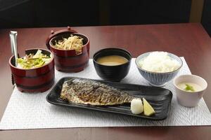 Saba Shio Rice Set served in a dish isolated on wooden table side view of singapore food photo