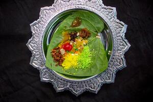 Cold indian paan masala on betel leaf top view photo