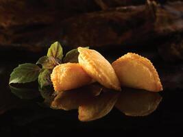 Deep-fried Shrimp Paste Puff served in dish isolated on table top view of food photo