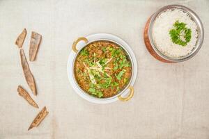 Mutton mint masala plain rice served in a dish isolated on table top view of indian spices food photo