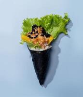 Spicy POKE SALMON wrap topping with salad leaves isolated on sky blue background top view fast food photo