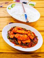 Chicken dragon with rice served in dish isolated on table top view of arab food photo