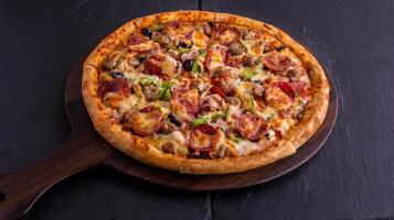 Beef Supreme pizza isolated on cutting board top view on dark background italian fast food photo